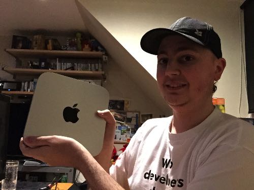 Me holding my Mac mini